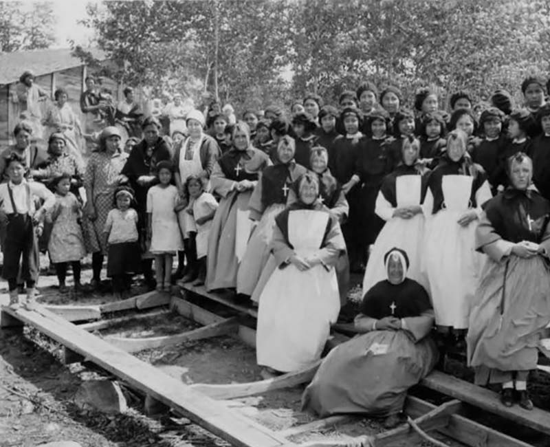 group of students and teachers outside at Beauval Ile a la Crosse school
