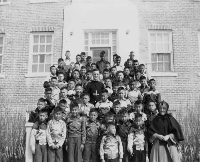 group of students and teachers outside at Beauval Ile a la Crosse school