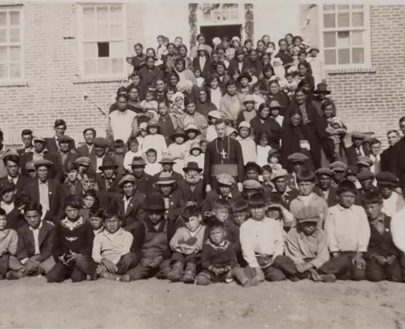 group of students and teachers outside at Beauval Ile a la Crosse school