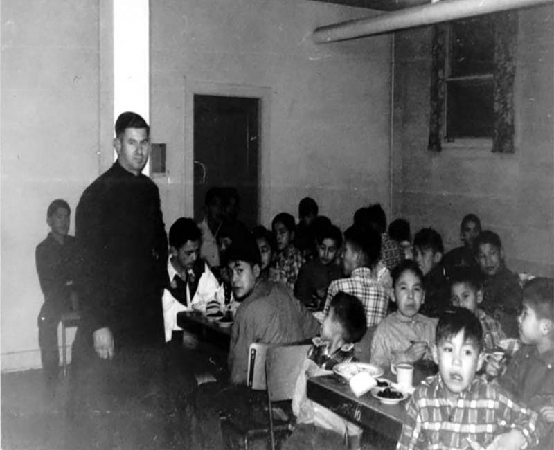 Group of students eating a tables from Cariboo Williams Lake School