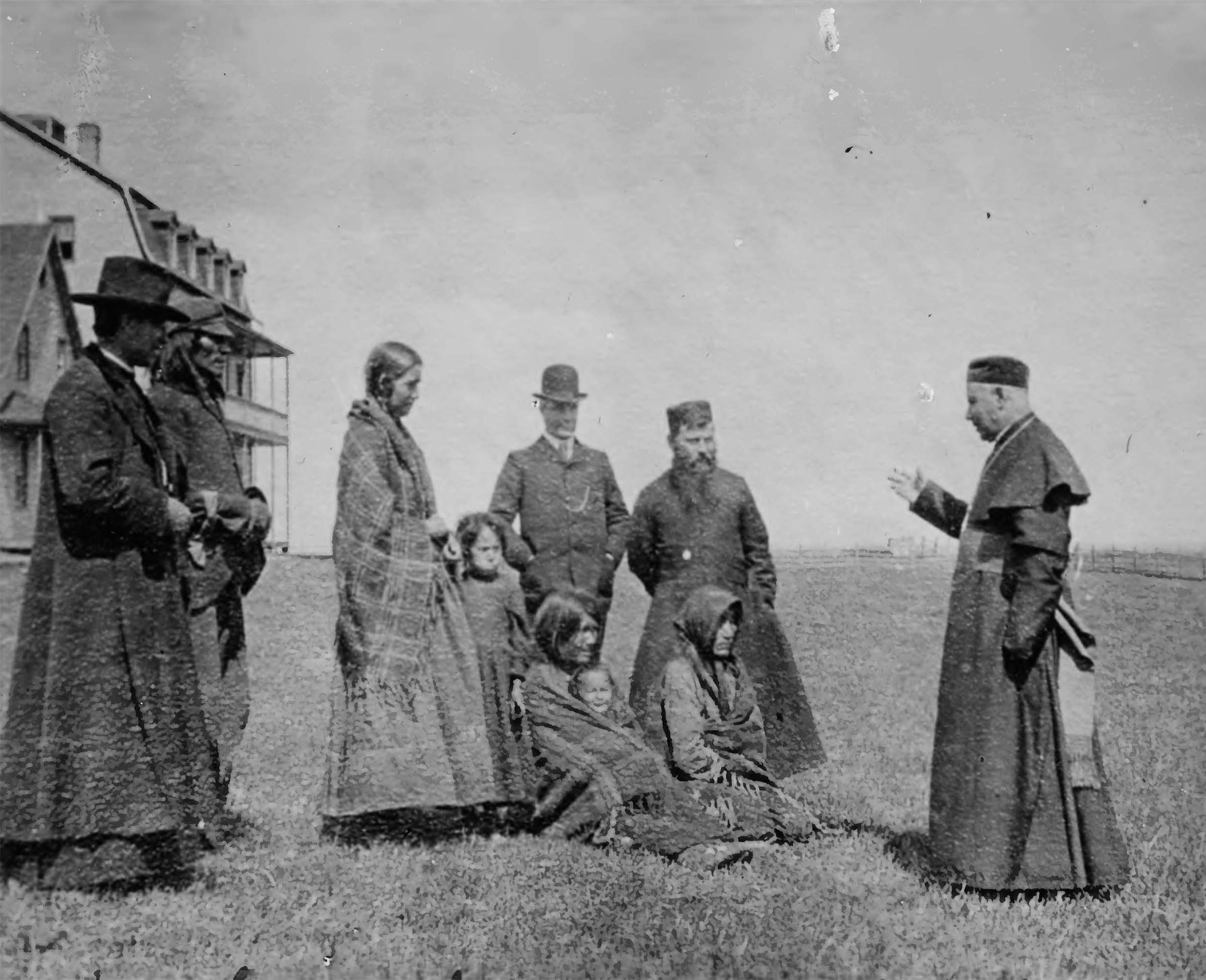 Group of people outside building at Ermineskin Hobbema school