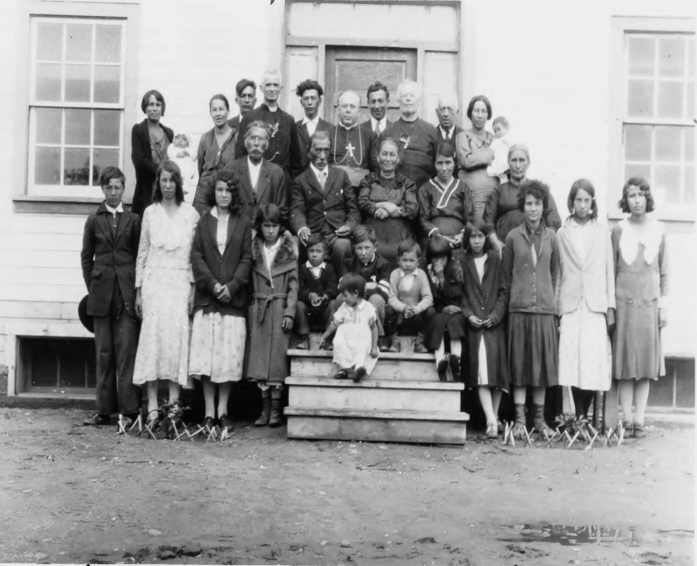 Group of people outside of building at Fort Vermilion St. Henri school 