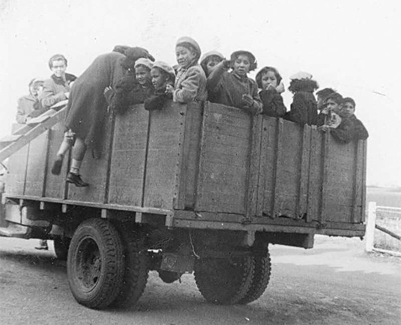 Group of children in wagon at Gordon's school