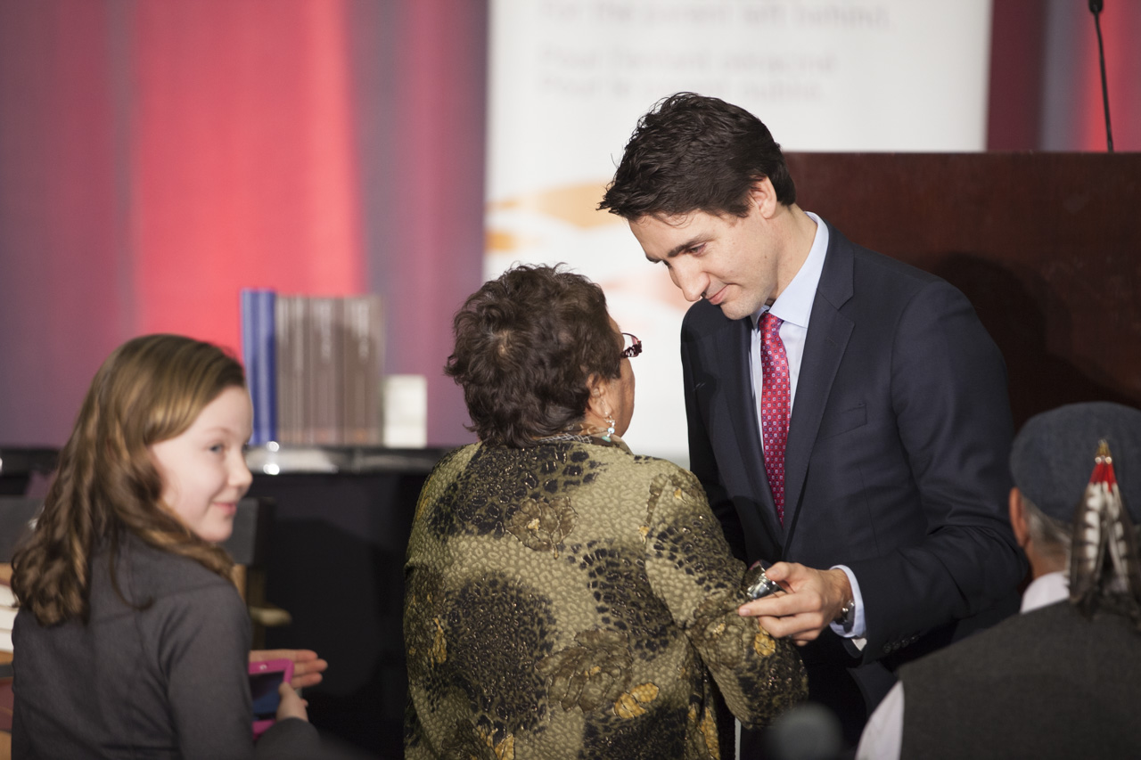 Prime Minister shaking hands at TRC closing ceremony