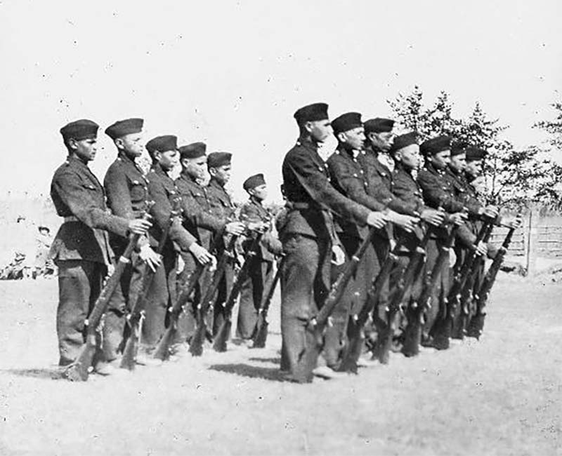 group of people outside of Prince Albert school in uniforms