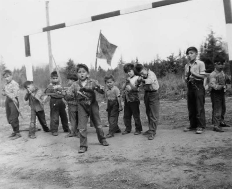 Group of students playing outside from Sechelt St. Augustines School