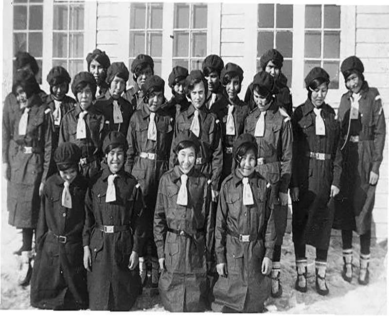 group of students posing for photo outside at All Saints school