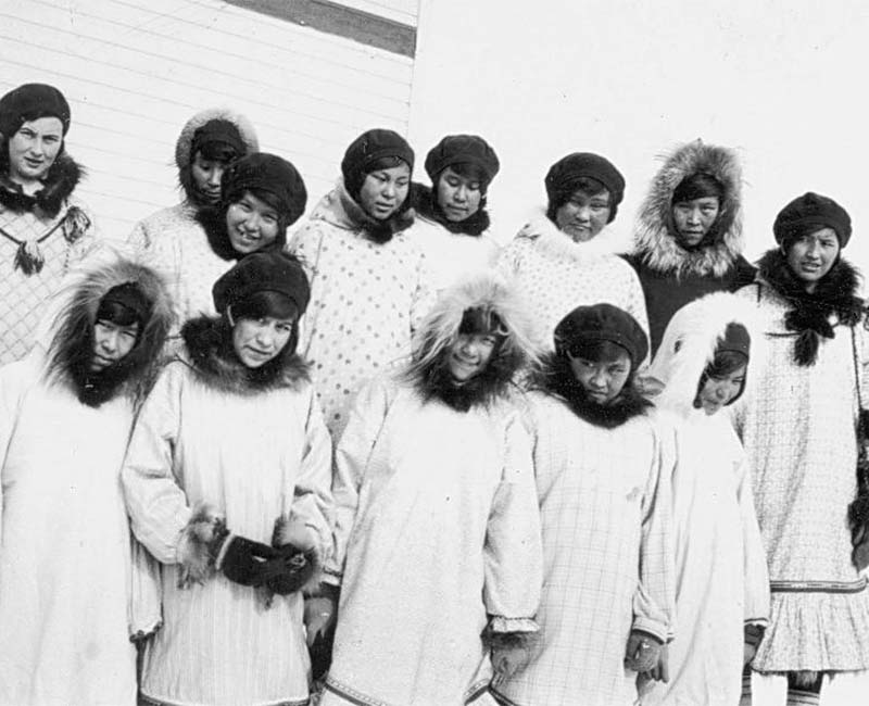Group of students posing for photo outside at All Saints school