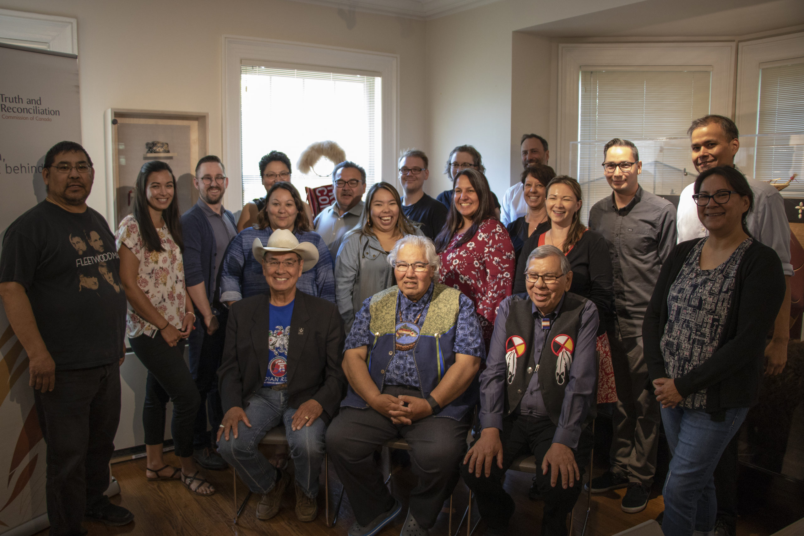 Group of Survivors and staff at NCTR bilding 