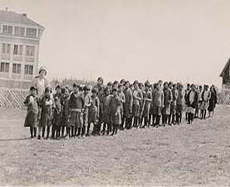 Group of students posed for photo outside Norway House school