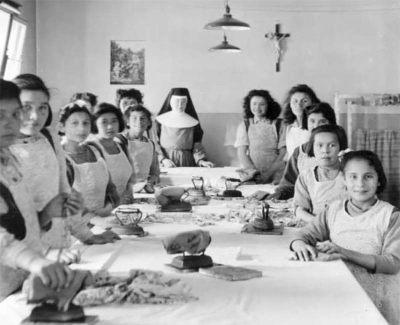 Group of students sitting at table from Pine Creek school