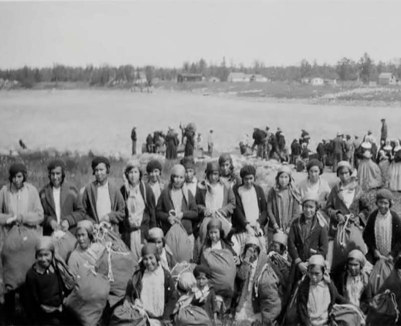 Group of people outside from Sturgeon Landing school
