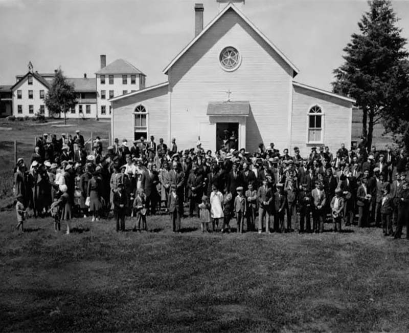 Group of students and teachers outside Thunderchild St. Henri building