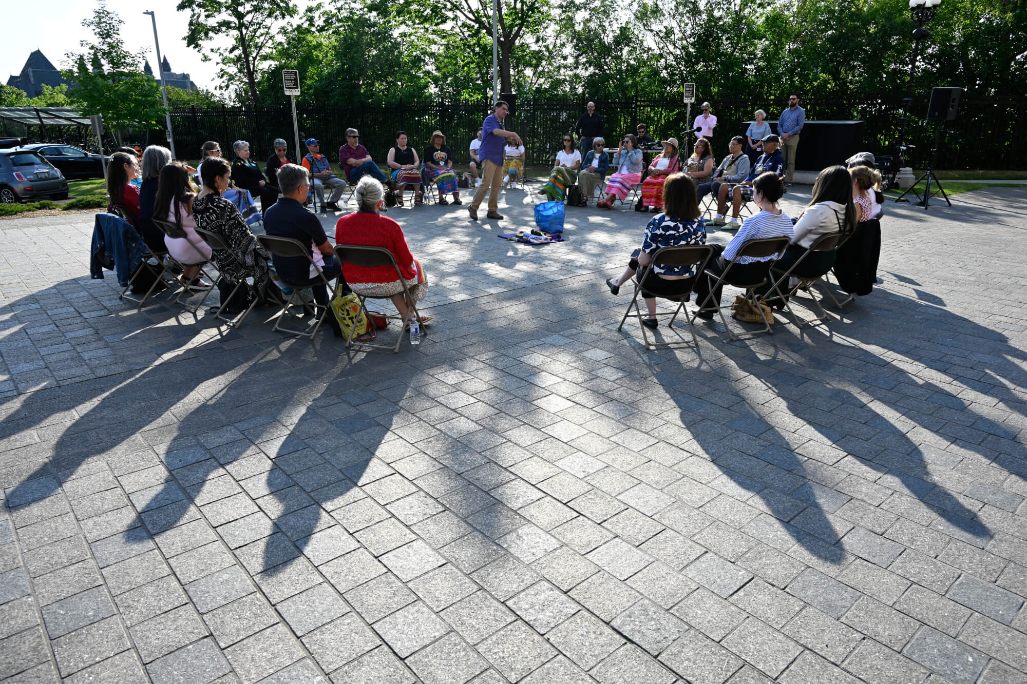 People sitting in a sharing circle.